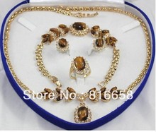 Изысканный комплект из ожерелья, браслета, серег и кольца из натурального нефрита «тигровый глаз» 2024 - купить недорого