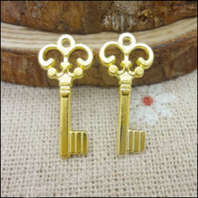 Colgante de llaves de color dorado para fabricación de joyas, 230 Uds., venta al por mayor 2024 - compra barato