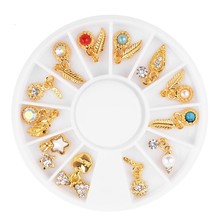 1 колесо, подвески для ногтей, золотистые металлические подвески для ногтевого дизайна, перо, сердце, галстук-бабочка, подвески, ювелирные изделия, 3D аксессуары для ногтей 2024 - купить недорого