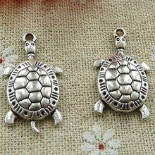 150 piezas de abalorios de tortuga de plata tibetana 30x16mm #839 2024 - compra barato