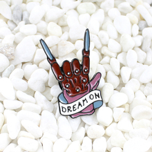 Skeleton finger Rock gesture White ribbon with the slogan "DREAM ON" Metal brooch Punk style personality creative badge 2024 - buy cheap