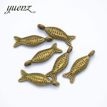 Yucozinhar 25 peças pingentes antigos de metal bronze peixe pingente para colar pulseira brinco faça você mesmo joias 20*6mm d7125 2024 - compre barato