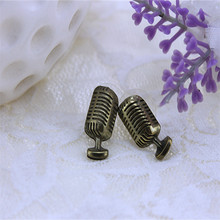 XQ Free shipping 2015 mini microphone female Earrings The new popular banquet texture 2024 - buy cheap