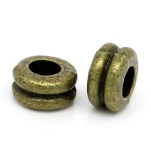 DoreenBeads Spacer Beads Dumbbell Metal Antique Bronze Color DIY Making Jewelry Findings 6mm x 3mm,Hole:Approx 2.6mm,200PCs 2024 - buy cheap