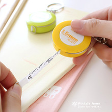 Cute Candy Colored Mini cinta de plástico MeasureSoft pies cinta medidas volumen regla Flexible círculo regla 2024 - compra barato