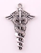 20pcs a lot Antique silver plated zinc studded with sparkling crystals Caduceus Medical Symbol Crystal Occupation Pendant 2024 - buy cheap