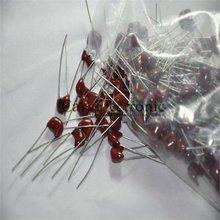 Wholesale 100pcs long lead New Silver MICA Capacitors 560pF 500V for tube audio guitar amps tone DIY parts free shipping 2024 - buy cheap