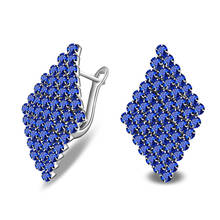 Женские серьги-гвоздики с ромбовидным синим кристаллом 2024 - купить недорого