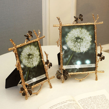 Europe Metal Alloy photo frame 6 inch 7 inch Golden butterfly picture frame table top Light luxury photo frame Home decoration 2024 - buy cheap