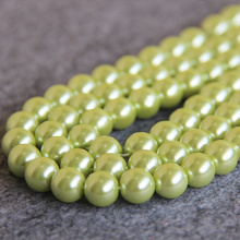 Moda hermosa 10mm luz verde Shell vidrio cuentas DIY regalo para mujeres cuentas 15 pulgadas 2 piezas/lote fabricación de joyas diseño al por mayor 2024 - compra barato