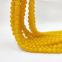 Wholesale 6mm/8mm/10mm yellow round glossy glass crystal loose beads DIY charm handmade jewelry making 2024 - buy cheap