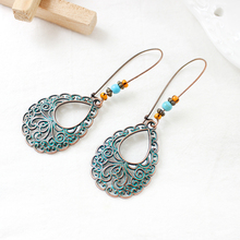 Individual ethnic wind hollow carved spiral moiré Drop shape String color beads hook earrings Vintage fashion jewelry 2024 - buy cheap