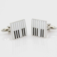 Gemelos de piano Blanco de C-MAN Camisa de lujo para hombre, joyería de alta calidad con botones 2024 - compra barato