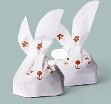 50 peças 13.5x22cm adorável coelho branco orelha biscoito plástico saco de comida bolo padaria pacote de doces de casamento embalagem de presente 2024 - compre barato