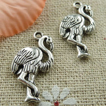 174 piezas de abalorios con forma de avestruz de plata tibetana 24x12mm #376 2024 - compra barato