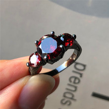 Женское кольцо, большой красный камень циркон, модное, черное, золотое, обручальное, уникальный стиль 2024 - купить недорого