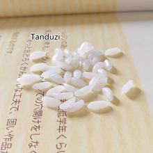 Tanduzi 50 г Милая имитация еды 1:1 имитация риса белый мягкий пластиковый миниатюрный рис японские декоративные детали миниатюры сделай сам 2024 - купить недорого