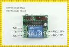 Transmissor e receptor de sistema de controle remoto sem fio, 2 botões, 12v 1 canais, à prova d'água, 315/433mhz, para porta de garagem/automóvel - foto 2026 Transmissor e receptor de sistema de controle remoto sem fio, 2 botões, 12v 1 canais, à prova d'água, 315/433mhz, para porta de garagem/automóvel - foto 2026