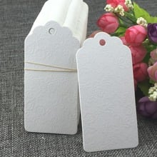 500pcs 9.5*4.5cm White Garment Tags Emboss Rose Hang Tags Wedding Gift Tags Paper Price Tag Gift Packing Labels/Paper Card 2024 - buy cheap