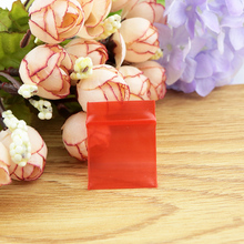 Sacos de Embalagem De plástico! 300 pçs/lote (3 cm * 4 cm) Red Ziplock Resealable Saco Plástico Mini PE Zip Lock Sacos espessura: 0.2mm 2024 - compre barato