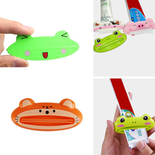 Dispensador de pasta de dientes con dibujos de animales, productos de baño, pinza para sacar los labios, 1 unidad 2024 - compra barato