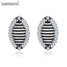 LUOTEEMI-Pendientes de tuerca a la moda para mujer, joyería hecha a mano, de lujo, brillante, CZ, cristal dorado, negro, para fiesta de citas, regalo de Navidad 2024 - compra barato