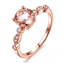 Женское кольцо цвета розового золота с фианитом и кристаллами цвета шампанского 2024 - купить недорого