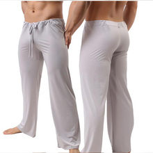 Pantalones de pijama de Casa de cintura baja para hombre, ropa de dormir Sexy, transparente, suelta, resbaladiza, seda de hielo 2024 - compra barato