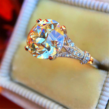 Loredana, stylish luxury female white bride gets married with a round super shiny semi-precious stone engagement ring 2024 - buy cheap