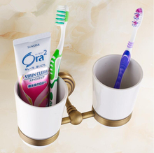 2016 accesorios de baño, vaso de cepillo de dientes con acabado de latón antiguo de estilo de moda y soporte de doble taza, diseño creativo, producto de baño 2024 - compra barato