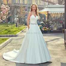 Vestido de novia de satén elegante con hombros descubiertos con faja de cuentas 2019 con bolsillos plisado tren de capilla vestido de novia 2024 - compra barato