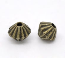 DoreenBeads Zinc metal alloy Spacer Beads Bicone Antique Bronze StripeColor Plated About 5mmx4mm,Hole:Approx 1mm,30 PCs new 2024 - buy cheap