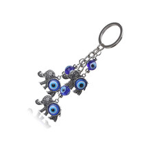 Turco Azul Evil Eye Pingente Chaveiro Borla Charme Elefante Chaveiro para Mulher Homens Animal Chave Anéis Chave Do Carro Titular dom casal 2024 - compre barato