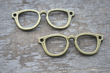 7 Uds.-abalorios para gafas, abalorios para gafas de tono bronce tibetano antiguo, 55x19mm 2024 - compra barato