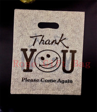 Wholesale 50pcs Plastic Shopping Bags With Handle 25x35cm Smile Face Print Black Boutique Clothing Packaging Plastic Gift Bag 2024 - buy cheap