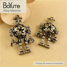BoYuTe (10 Pieces /lot) 43*24MM Antique Bronze Plated Zinc Alloy Hollow Robot Charms Diy Pendants for Jewelry Making 2024 - buy cheap