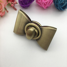 High quality Bowknot Shape Clasp Turn Locks Twist Lock DIY Leather Handbag Bag Hardware Bags Accessories Bronze 2024 - buy cheap