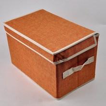 2015 caja de almacenamiento plegable de tela no tejida color naranja ST001 caja de almacenamiento/papelera envío gratis 2024 - compra barato