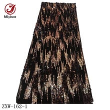 Tela de encaje de lentejuelas nigerianas africanas 5 yardas secuencia de colores mezclados tela de encaje de tul moda encaje de red para vestidos de fiesta ZXW-162 2024 - compra barato