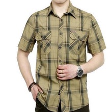 Короткая рубашка в повседневном стиле большого размера, цвет хаки, мужские летние свободные рубашки с коротким рукавом 100% 2024 - купить недорого