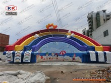 Tobogán acuático inflable gigante del arco iris/tobogán acuático inflable colorido para el parque acuático 2024 - compra barato