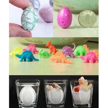 2 pçs colorido dinossauro adicionar rachaduras crescer ovos bonito magia água crescente ovo incubação crianças meninos decoração de casa 2024 - compre barato
