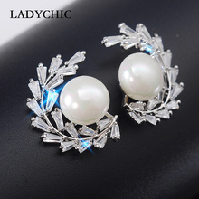 LADYCHIC Elegant Design Olive Branch Leaves Shape Cubic Zirconia Stud Earrings White Pearl Earring for Wedding Jewelry LE1308 2024 - buy cheap