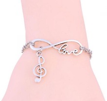 ¡Pulsera de la suerte! 5 uds. De moda calado Animal huella pata garra Linda Cámara música notación infinito colgante pulsera cadena encanto amor 2024 - compra barato