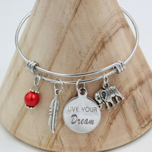 Pulsera de acero inoxidable para mujer, brazalete de alambre ajustable, Pulsera inspiradora de pluma de elefante, joyería, 1 ud. 2024 - compra barato