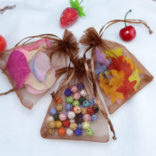 Bolsas pequeñas de Organza de 7x9cm, 100 unids/lote, de alta calidad, para regalo de dulces de boda, embalaje de joyería 2024 - compra barato