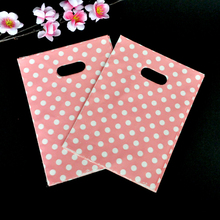 100 шт./лот 15x20 см розовый пластиковый подарочный пакет в горошек, милый мешочек для ювелирных изделий, маленькие мешочки для конфет с подвесками, упаковочные сумки с ручкой 2024 - купить недорого