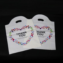 50 pcs-pe saco de presente de plástico com alça "obrigado" cosméticos saco de compras para presente de aniversário festa de casamento envoltório de doces 2024 - compre barato
