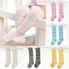 Новые носки для маленьких мальчиков и девочек милые Нескользящие Гольфы унисекс для новорожденных однотонные теплые длинные носки для новорожденных 2024 - купить недорого