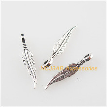 100 New Tiny Feather leaf Tibetan Silver Color Charms Pendants 3x16mm 2024 - compre barato